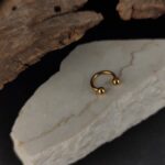 Piercing za septum , helix pirsing